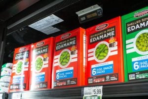 Processed edamame snacks on a grocery shelf